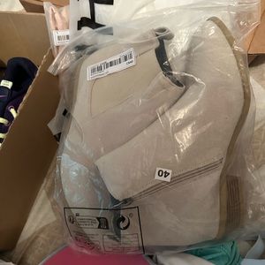 Woman’s cream/tan booties